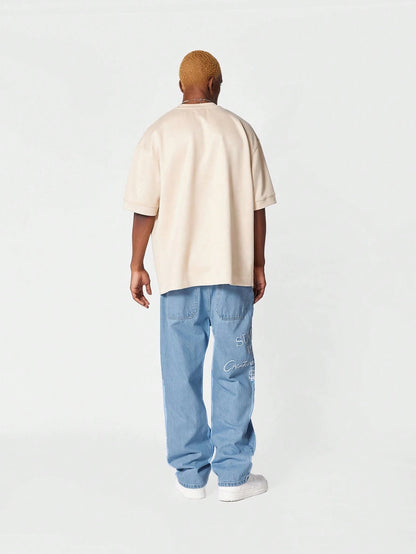 Calça Denim reta com bordado