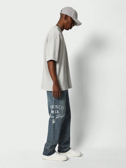 Calça Denim reta com bordado