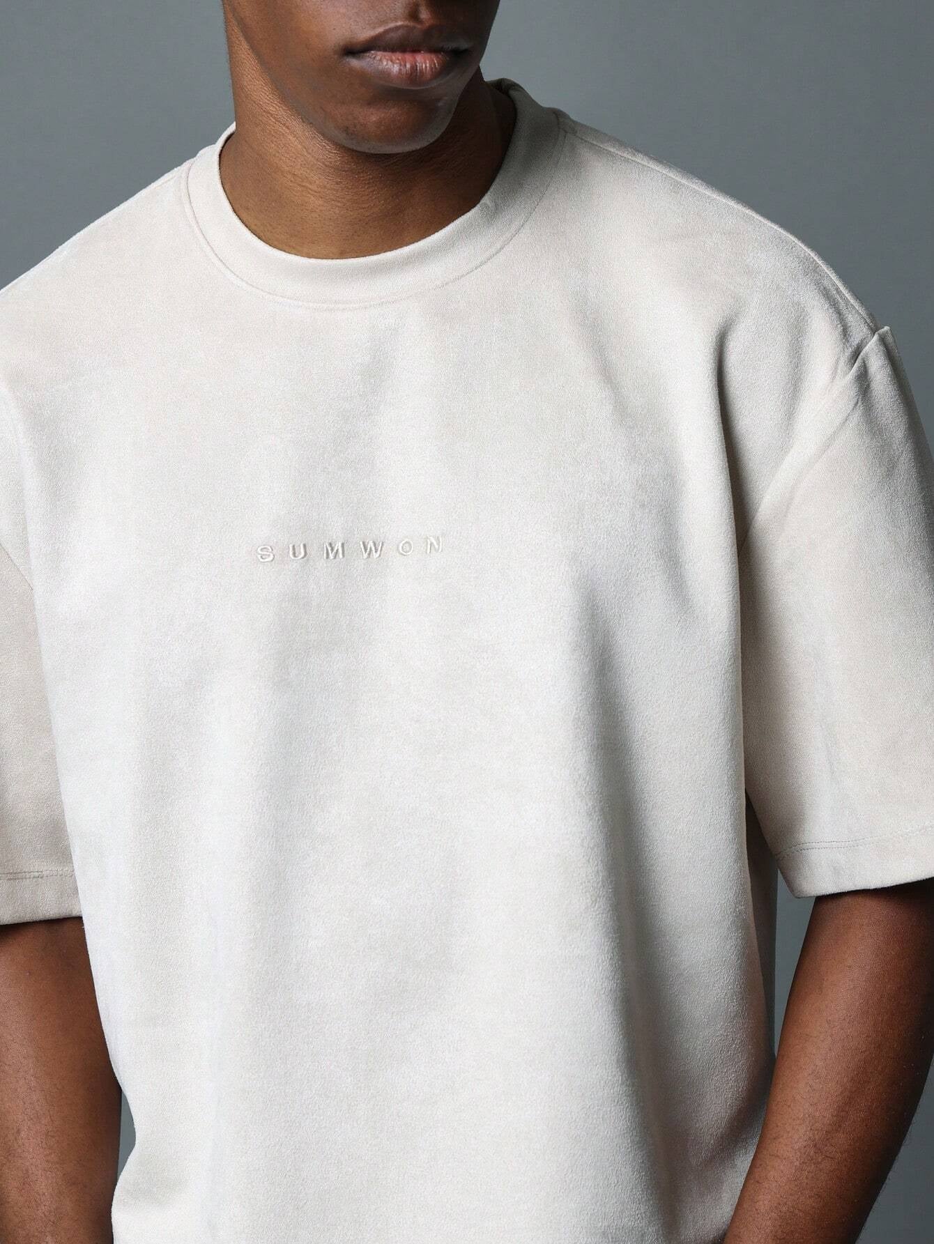 Camiseta em Camurça Bordado 9