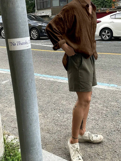 Camisa Casual Soltinha e Folgada de Manga Longa com Bolso e Abotoamento